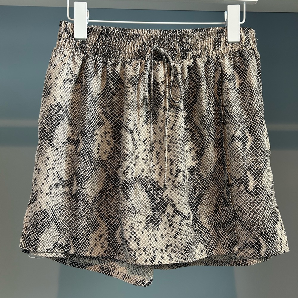 NWT Tyche wrap front skirt. Size large. Snakeskin print. So pretty!